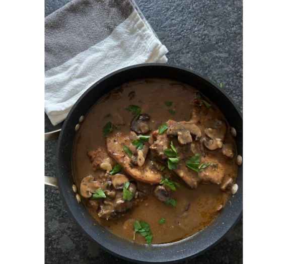 Porkchops In Garlic Mushroom Sauce Is A Cozy And Easy Meal